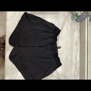 Black lululemon tracker shorts long